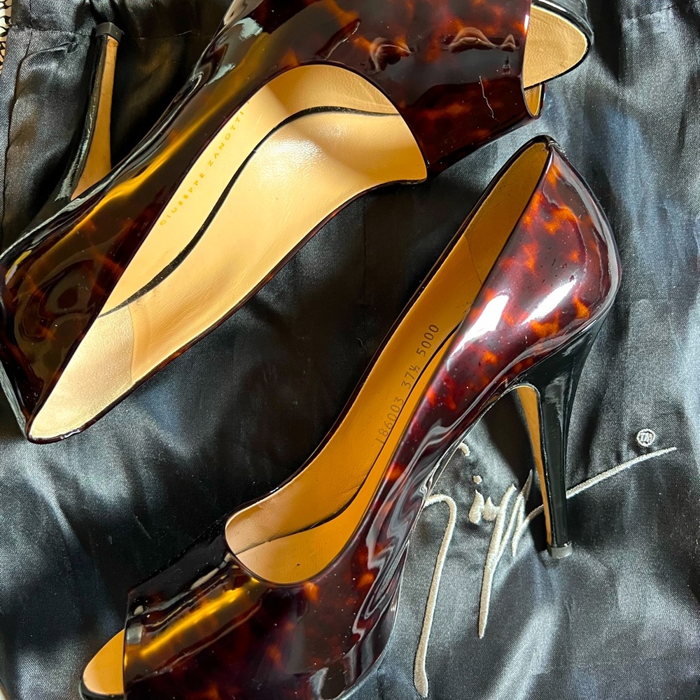 Giuseppe Zanotti — Patent Leather Platform Peep Toe Heels in Tortoise Shell.